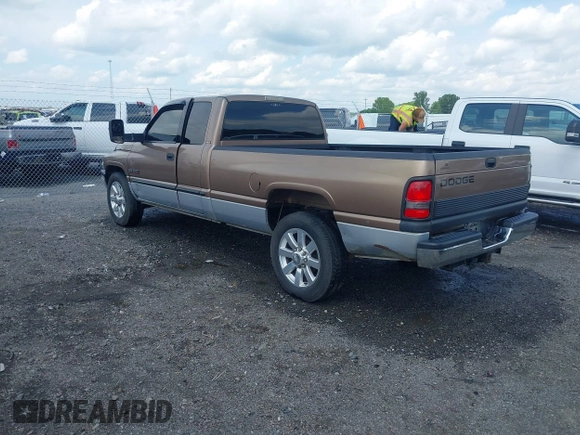2001 Dodge 2500 with VIN 1B7KC23651J224436, listed as a IAAI auction lot 42013282 with 218,831 mi miles. Bid and sale history available at carsss.com. Image 3.