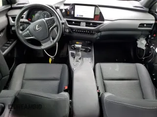 2023 Lexus UX 250h Premium с VIN JTHP6JBH8P2133821, выставлен на аукционе Copart как лот 61007355 с пробегом 32 540 миль миль и Списание • Salvage title. История ставок и продаж доступна на DreamBid. Изображение 8.