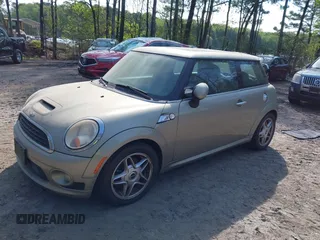 2010 MINI Hardtop S with VIN WMWMF7C58ATX45365, listed as a IAAI auction lot 42035404 with 26,393 mi miles and . Bid and sale history available at DreamBid. Image 2.