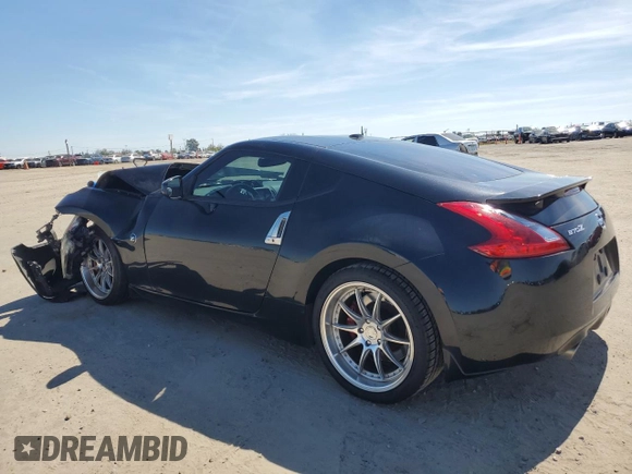 2013 Nissan 370Z Touring z VIN JN1AZ4EH4DM881576, wystawiony jako Copart lot #50645635 z przebiegiem 123 515 mil mil oraz Szkoda całkowita • Salvage title. Historia ofert i sprzedaży dostępna na DreamBid. Obrazek 2.