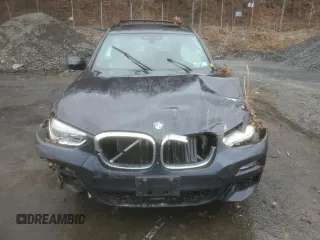 2018 BMW X3 xDrive30i with VIN 5UXTR9C50JLD59882, listed as a Copart auction lot 49089985 with 0 mi miles and Salvage Title. Bid and sale history available at carsss.com. Image 5.