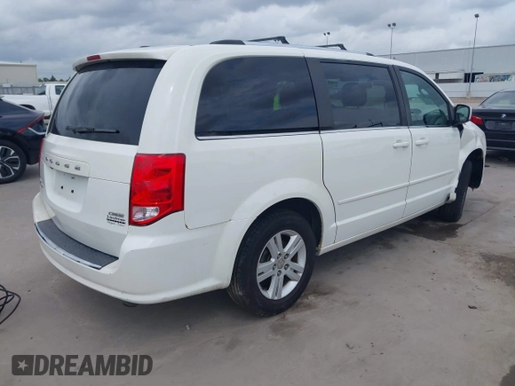 2011 Dodge Grand Caravan Crew with VIN 2D4RN5DGXBR786592, listed as a IAAI auction lot 42114198 with 243,423 mi miles and . Bid and sale history available at DreamBid. Image 4.