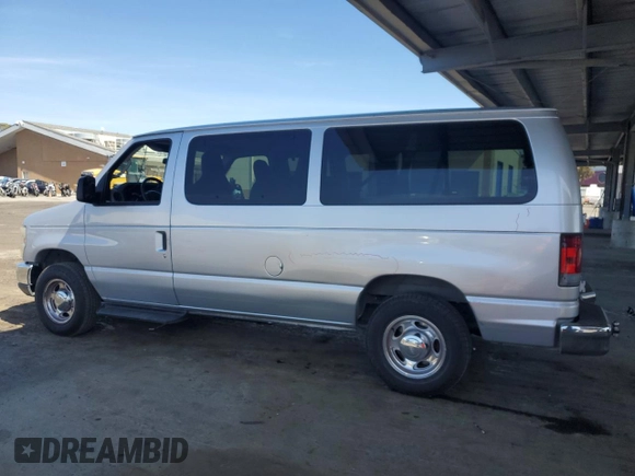 2010 Ford Econoline Passenger XL with VIN 1FMNE1BW3ADA25124, listed as a Copart auction lot 56899235 with 244,010 mi miles and Salvage title. Bid and sale history available at DreamBid. Image 2.