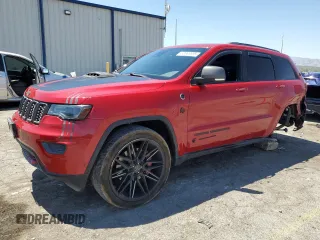 2019 Jeep Grand Cherokee Trailhawk with VIN 1C4RJFLT4KC787940, listed as a Copart auction lot 60883895 with 77,160 mi miles and Salvage title. Bid and sale history available at DreamBid. Image 1.