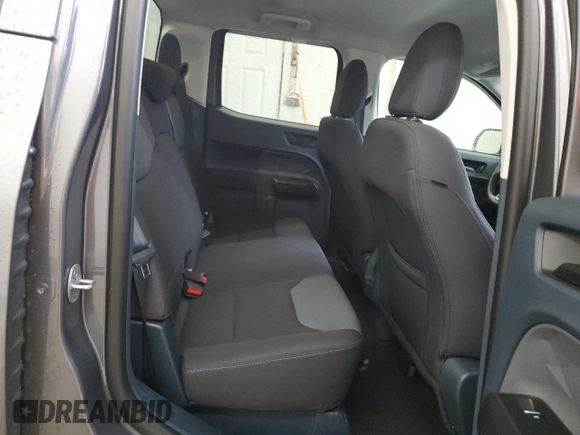2023 Ford Maverick XL with VIN 3FTTW8E34PRA97954, listed as a Copart auction lot 52349255 with 27,367 mi miles and Salvage Title. Bid and sale history available at DreamBid. Image 10.