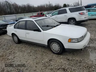 1990 Nissan Maxima z VIN JN1HJ01P4LT450350, wystawiony jako Copart lot #45054615 z przebiegiem 225 239 mil mil oraz Tytuł czysty. Historia ofert i sprzedaży dostępna na DreamBid. Obrazek 4.