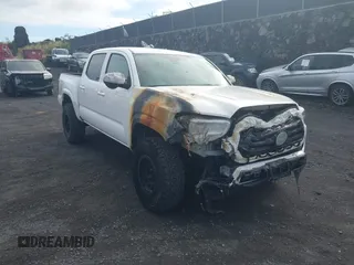 2023 Toyota Tacoma SR with VIN 3TYCZ5AN4PT168312, listed as a IAAI auction lot 42555775 with 8,288 mi miles and . Bid and sale history available at DreamBid. Image 6.