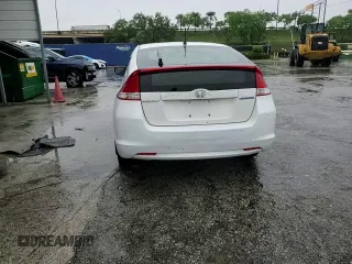 2011 Honda Insight EX z VIN JHMZE2H79BS009016, wystawiony jako Copart lot #59098615 z przebiegiem 136 715 mil mil oraz Szkoda całkowita • Salvage title. Historia ofert i sprzedaży dostępna na DreamBid. Obrazek 13.
