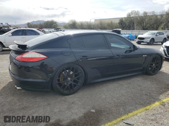 2011 Porsche Panamera with VIN WP0AA2A7XBL014899, listed as a Copart auction lot 51489215 with 112,585 mi miles and Salvage title. Bid and sale history available at DreamBid. Image 3.