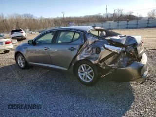 2013 Kia Optima LX z VIN 5XXGM4A76DG244326, wystawiony jako Copart lot #48129005 z przebiegiem 102 501 mil mil oraz Nie do naprawy • Non repairable. Historia ofert i sprzedaży dostępna na DreamBid. Obrazek 2.