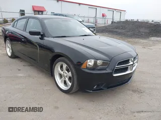 2013 Dodge Charger SXT with VIN 2C3CDXHG2DH525370, listed as a IAAI auction lot 41395980 with 226,079 mi miles. Bid and sale history available at carsss.com. Image 1.
