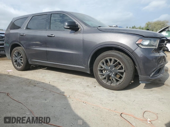 2016 Dodge Durango R/T with VIN 1C4SDJCT4GC467648, listed as a Copart auction lot 54738375 with 116,520 mi miles and Salvage Title. Bid and sale history available at DreamBid. Image 4.
