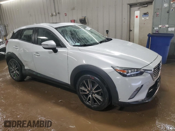 2017 Mazda CX-3 Touring with VIN JM1DKFC76H0161813, listed as a Copart auction lot 50931135 with 133,561 mi miles and Salvage Title. Bid and sale history available at carsss.com. Image 4.