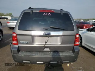 2012 Ford Escape Limited z VIN 1FMCU0EG1CKB30638, wystawiony jako Copart lot #52905205 z przebiegiem 169 683 mil mil oraz Szkoda całkowita • Salvage title. Historia ofert i sprzedaży dostępna na DreamBid. Obrazek 6.