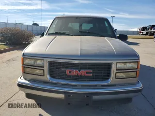 1999 GMC Yukon with VIN 1GKEC13R3XJ806033, listed as a Copart auction lot 80365934 with 154,984 mi miles and Clean Title. Bid and sale history available at carsss.com. Image 5.