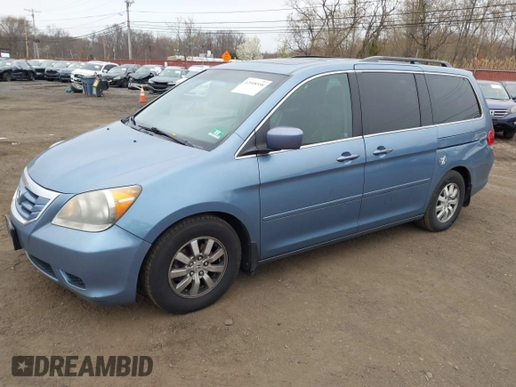 2010 Honda Odyssey EX-L with VIN 5FNRL3H79AB088793, listed as a IAAI auction lot 42008558 with 282,980 mi miles. Bid and sale history available at carsss.com. Image 2.
