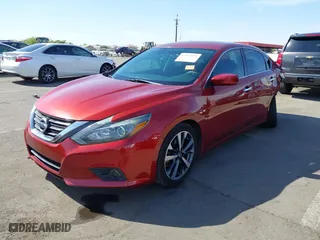 2016 Nissan Altima 2.5 SL with VIN 1N4AL3AP4GC122089, listed as a IAAI auction lot 41965851 with 121,608 mi miles. Bid and sale history available at carsss.com. Image 2.