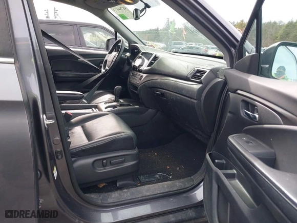 2016 Honda Pilot EX-L with VIN 5FNYF6H55GB023645, listed as a IAAI auction lot 41784613 with 146,724 mi miles. Bid and sale history available at carsss.com. Image 5.