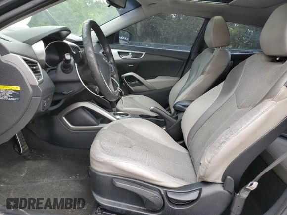2012 Hyundai Veloster w/Black Int with VIN KMHTC6AD0CU059003, listed as a Copart auction lot 58480625 with 133,137 mi miles and Salvage title. Bid and sale history available at DreamBid. Image 7.