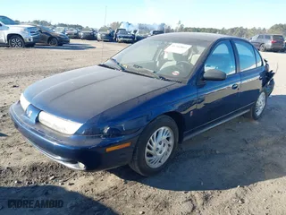 1999 Saturn SL with VIN 1G8ZK5278XZ355779, listed as a IAAI auction lot 41342864 with 96,593 mi miles. Bid and sale history available at carsss.com. Image 18.