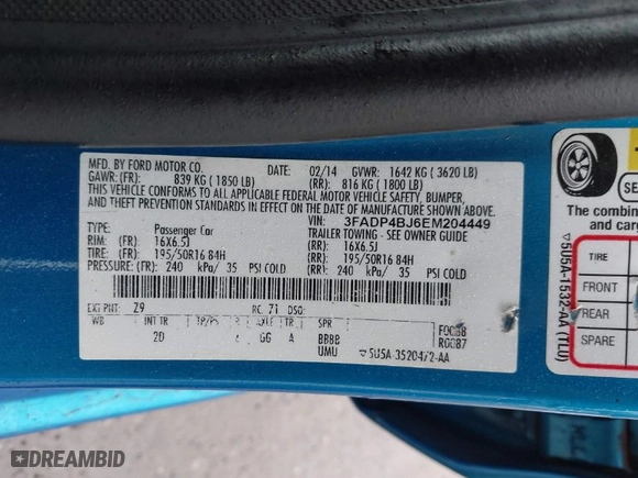 2014 Ford Fiesta SE with VIN 3FADP4BJ6EM204449, listed as a IAAI auction lot 41992813 with 92,026 mi miles. Bid and sale history available at carsss.com. Image 9.