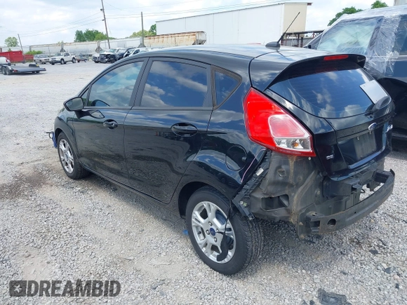 2016 Ford Fiesta SE with VIN 3FADP4EJ2GM150453, listed as a IAAI auction lot 42104235 with 124,423 mi miles and . Bid and sale history available at carsss.com. Image 3.