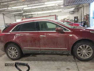 2017 Cadillac XT5 Luxury AWD with VIN 1GYKNDRS4HZ257413, listed as a IAAI auction lot 41537197 with 124,184 mi miles and . Bid and sale history available at DreamBid. Image 13.