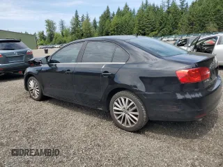 2014 Volkswagen Jetta SEL with VIN 3VWL17AJ2EM440524, listed as a Copart auction lot 61206685 with 104,987 mi miles and Salvage title. Bid and sale history available at DreamBid. Image 2.