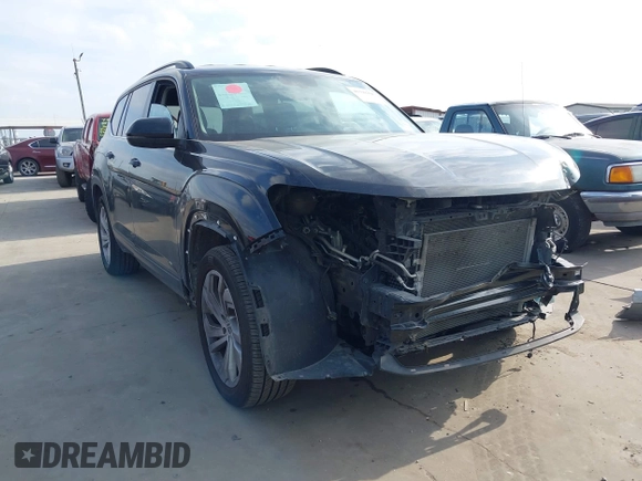 2021 Volkswagen Atlas SE z VIN 1V2HR2CA0MC543876, wystawiony jako IAAI lot #41598298 z przebiegiem 99 171 mil mil oraz . Historia ofert i sprzedaży dostępna na DreamBid. Obrazek 1.