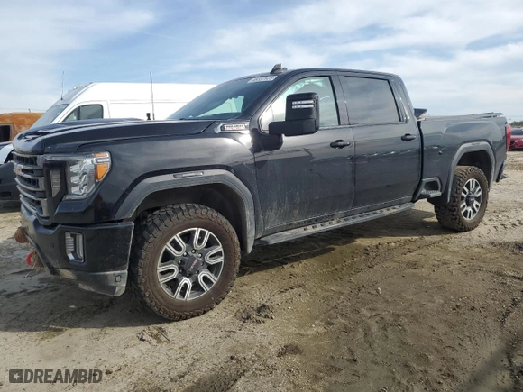 2021 GMC Sierra 2500HD AT4 with VIN 1GT49PEY0MF193638, listed as a Copart auction lot 48352925 with 140,995 mi miles and Salvage Title. Bid and sale history available at carsss.com. Image 1.
