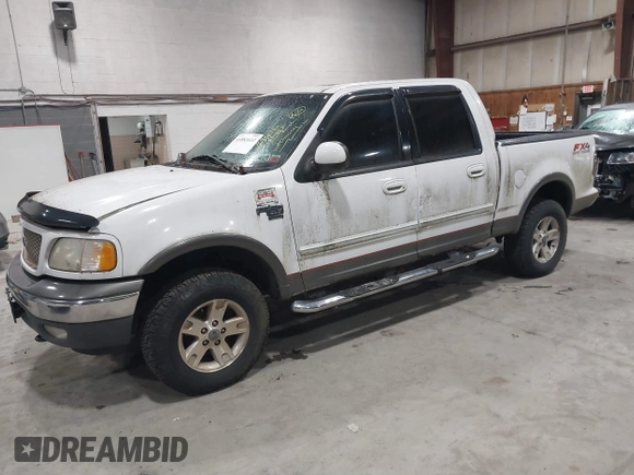 2002 Ford F-150 XLT with VIN 1FTRW08L02KE16948, listed as a IAAI auction lot 41881612 with 168,471 mi miles. Bid and sale history available at carsss.com. Image 2.