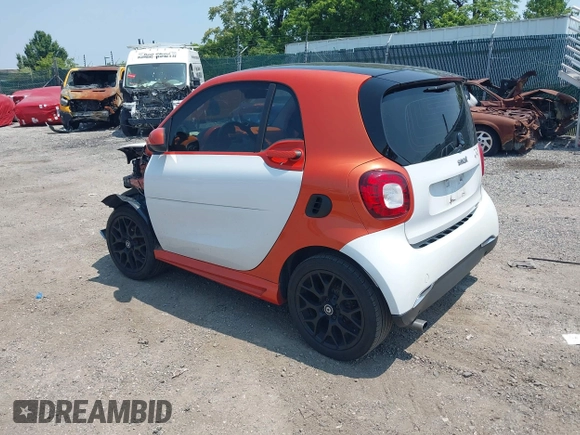 2016 Smart fortwo Passion with VIN WMEFJ5DA7GK079058, listed as a IAAI auction lot 42415044 with 42,279 mi miles and . Bid and sale history available at DreamBid. Image 3.