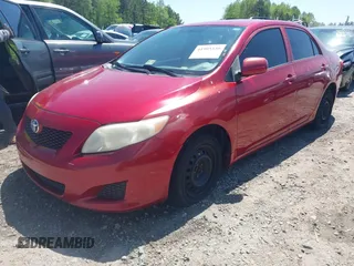 2009 Toyota Corolla with VIN JTDBL40E999080233, listed as a IAAI auction lot 41995330 with 249,789 mi miles. Bid and sale history available at carsss.com. Image 17.