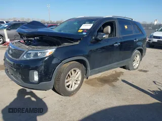 2014 Kia Sorento LX with VIN 5XYKT4A79EG482567, listed as a IAAI auction lot 41832550 with Not Provided miles and . Bid and sale history available at carsss.com. Image 2.
