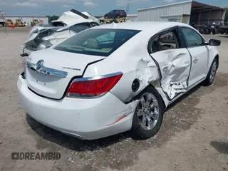 2013 Buick LaCrosse Leather with VIN 1G4GC5E30DF280524, listed as a IAAI auction lot 42216828 with 107,045 mi miles and . Bid and sale history available at DreamBid. Image 4.
