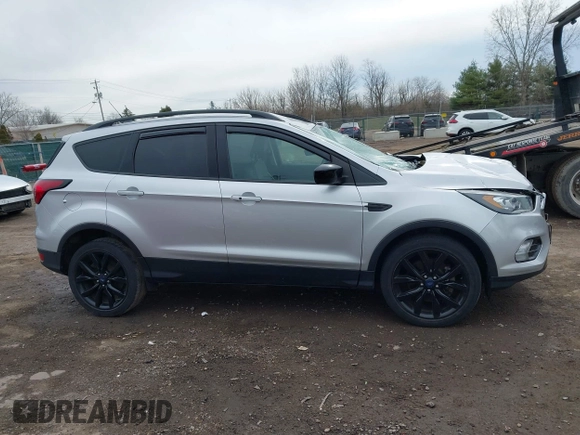 2019 Ford Escape SE with VIN 1FMCU9GD7KUB29309, listed as a IAAI auction lot 41876535 with 90,688 mi miles. Bid and sale history available at carsss.com. Image 13.
