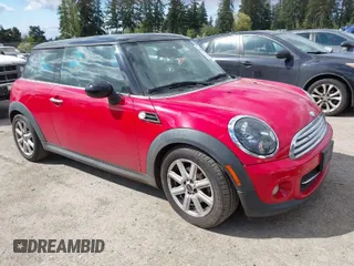 2013 MINI Cooper Hardtop with VIN WMWSU3C57DT677506, listed as a IAAI auction lot 42088836 with 130,344 mi miles. Bid and sale history available at carsss.com. Image 1.