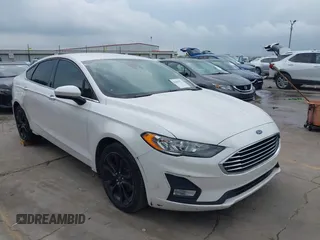 2020 Ford Fusion SE z VIN 3FA6P0HD0LR168907, wystawiony jako IAAI lot #42365892 z przebiegiem 72 786 mil mil oraz . Historia ofert i sprzedaży dostępna na DreamBid. Obrazek 1.