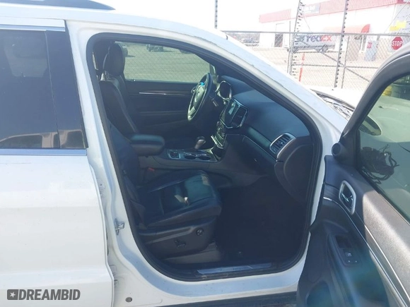 2019 Jeep Grand Cherokee Limited with VIN 1C4RJFBG3KC734697, listed as a IAAI auction lot 41645913 with 128,419 mi miles. Bid and sale history available at carsss.com. Image 5.