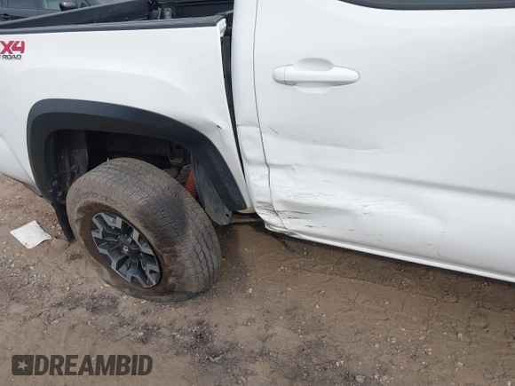 2023 Toyota Tacoma SR z VIN 3TMCZ5AN1PM637609, wystawiony jako IAAI lot #40345917 z przebiegiem 12 614 mil mil oraz . Historia ofert i sprzedaży dostępna na DreamBid. Obrazek 19.