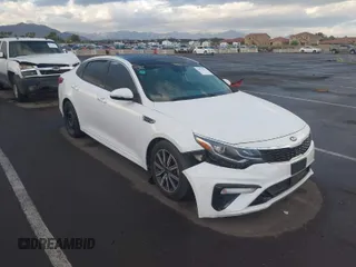 2019 Kia Optima EX with VIN 5XXGU4L14KG302388, listed as a IAAI auction lot 40636313 with 135,095 mi miles. Bid and sale history available at carsss.com. Image 1.