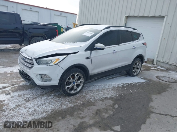 2017 Ford Escape SE with VIN 1FMCU0G94HUA55492, listed as a IAAI auction lot 40881436 with 168,481 mi miles and . Bid and sale history available at carsss.com. Image 2.