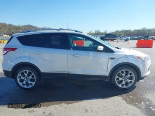 2013 Ford Escape Titanium with VIN 1FMCU0J96DUA71857, listed as a IAAI auction lot 41877003 with 118,864 mi miles and . Bid and sale history available at carsss.com. Image 13.