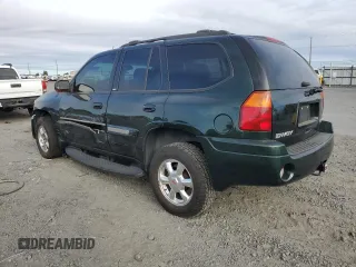 2004 GMC Envoy SLT with VIN 1GKDT13S642185410, listed as a Copart auction lot 72572504 with 136,193 mi miles and Salvage Title. Bid and sale history available at DreamBid. Image 2.