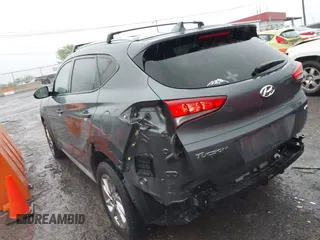 2018 Hyundai Tucson SEL with VIN KM8J3CA4XJU640429, listed as a IAAI auction lot 42063900 with 124,844 mi miles. Bid and sale history available at carsss.com. Image 3.