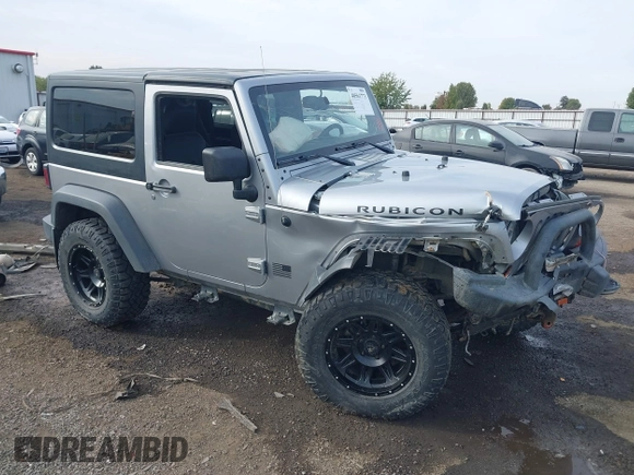 2013 Jeep Wrangler Rubicon 10th Anniversary with VIN 1C4BJWCG8DL639121, listed as a IAAI auction lot 40561773 with 56,023 mi miles and . Bid and sale history available at DreamBid. Image 1.