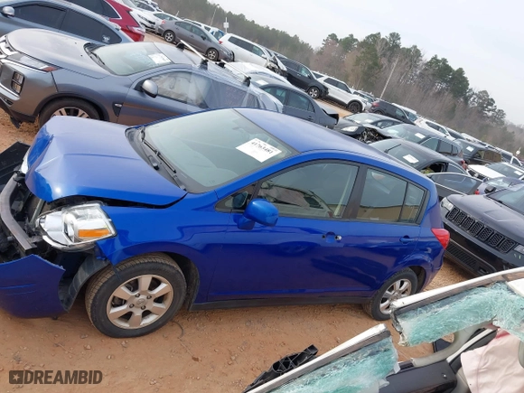 2012 Nissan Versa S with VIN 3N1BC1CP0CK239739, listed as a IAAI auction lot 41763481 with 146,605 mi miles. Bid and sale history available at carsss.com. Image 14.