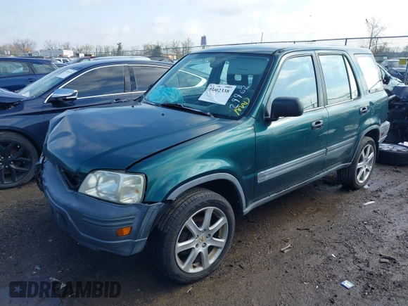 1999 Honda CR-V LX with VIN JHLRD1847XC049104, listed as a IAAI auction lot 42002338 with 213,503 mi miles. Bid and sale history available at carsss.com. Image 17.