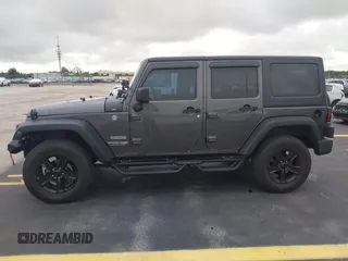 2018 Jeep Wrangler Unlimited Sport S with VIN 1C4BJWDG1JL810754, listed as a IAAI auction lot 42419199 with 74,901 mi miles and . Bid and sale history available at DreamBid. Image 14.