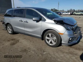 2019 Honda Odyssey EX-L with VIN 5FNRL6H77KB043158, listed as a Copart auction lot 50511625 with 74,850 mi miles and Salvage Title. Bid and sale history available at carsss.com. Image 4.